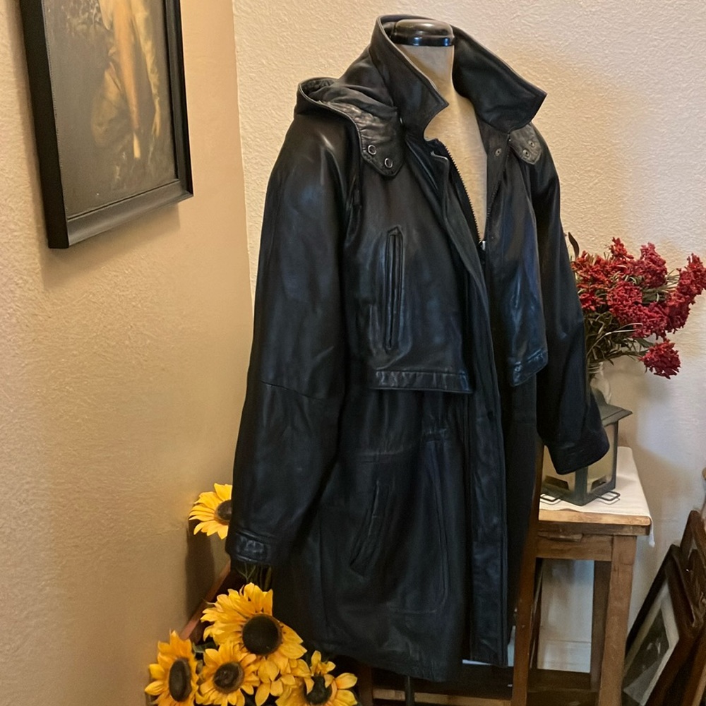 Black soft leather coat with removable hood & zip out insulated lining. Size XL